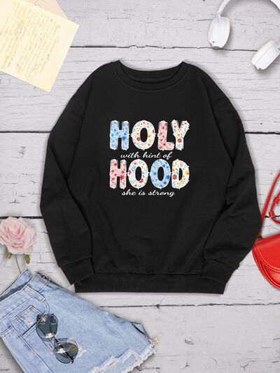 HOLY WITH HINT OF HOOD SHE IS STRONG Round Neck Sweatshirt